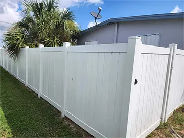 Custom vinyl fence installation.