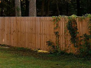Custom wood fence installation.