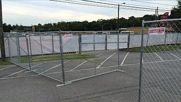 White vinyl fence installation by Fence Man Fencing.